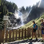 In Near Europe's Highest Waterfall Chalet Krimml