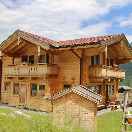 In Near Europe's Highest Waterfall Alpehytte *